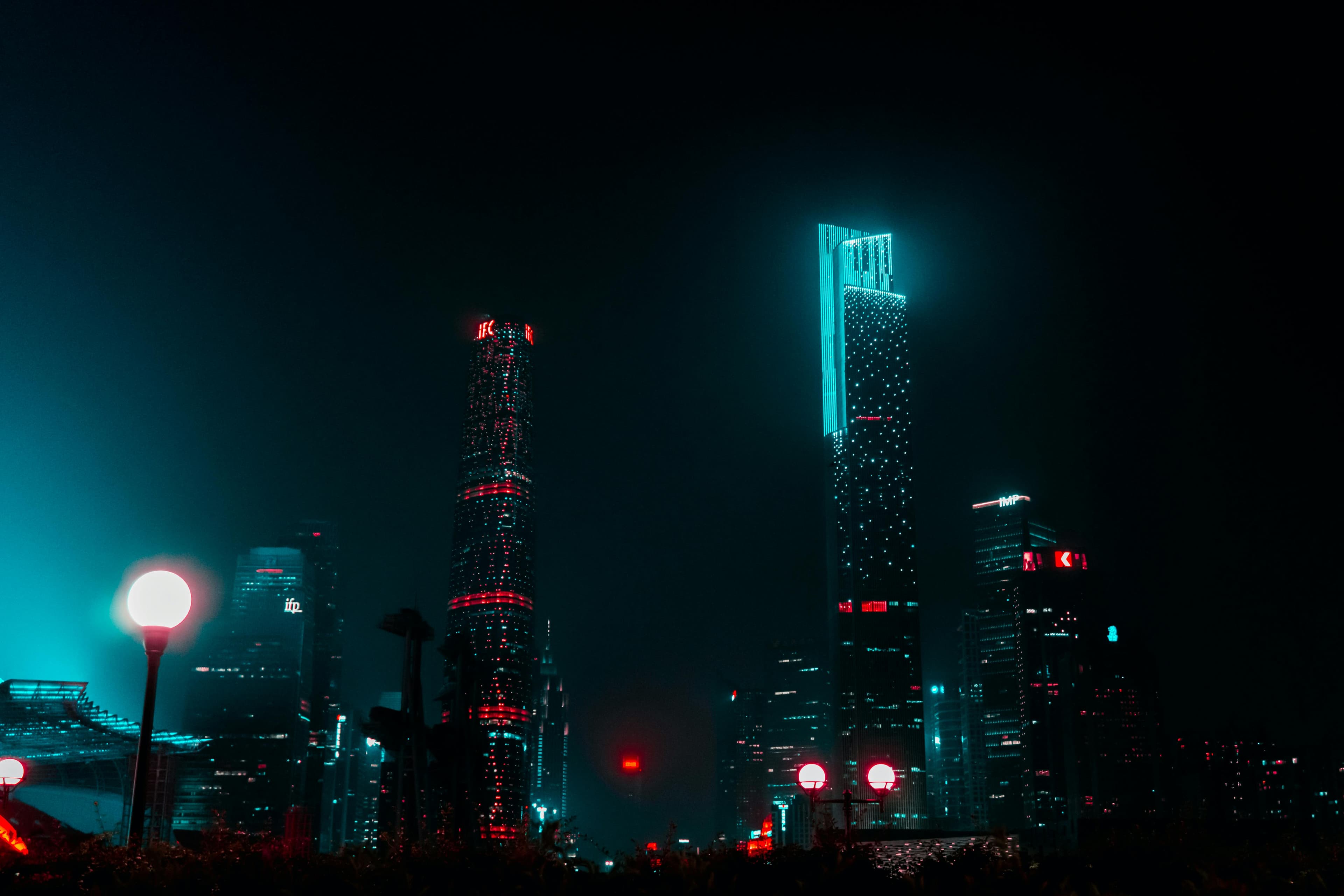 Picture of some chinese city at night with cyberpunk vibe